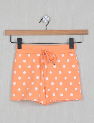 Printed peach hue cotton shorts for girls