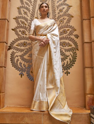 Ravishing off white silk saree with zari work for occasion