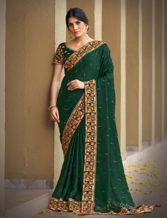 Rich dark green extravagant silk saree for wedding look