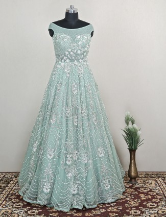 Rich pistachio green net gown for wedding and party wear