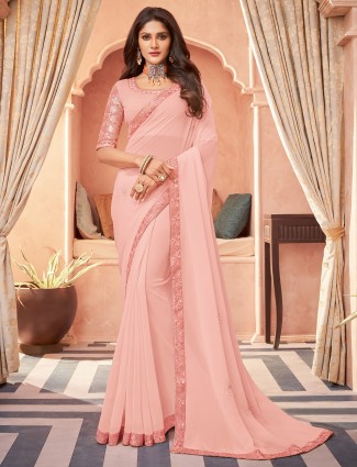 Spectacular baby pink georgette party saree