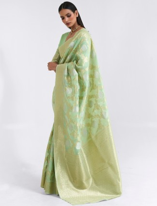 Splendid sea green festive events cotton linen saree