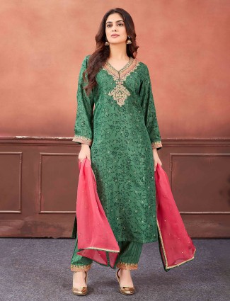 Stunning dark green printed salwar suit in silk