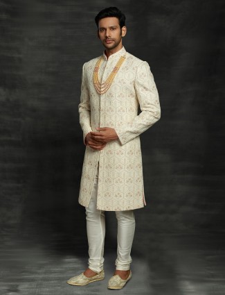 Stylish groom cream lakhnavi sherwani in silk