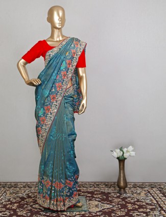 Teal blue colored patola silk saree