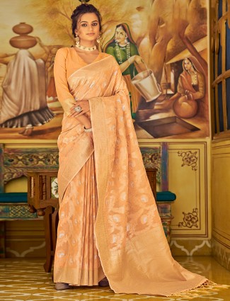 Trendy sandstone orange saree for wedding