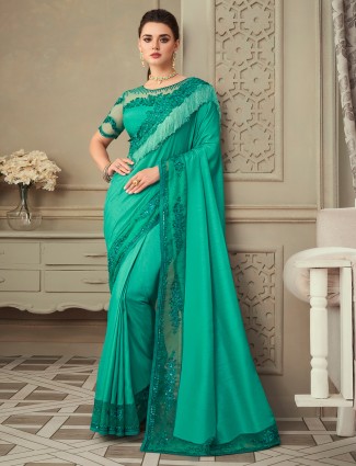 Turquoise green extravagant designer raw silk sari