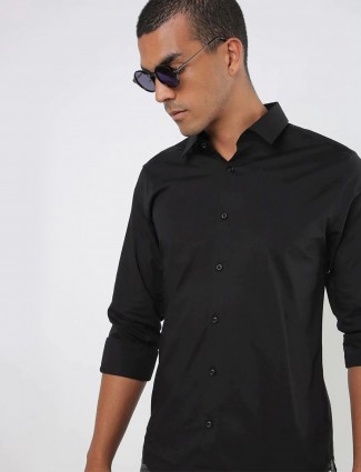 UCB solid style black shirt for men