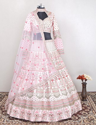 Wedding and bridal wear powder pink lehenga choli in raw silk