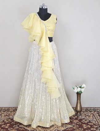 Wedding functions light yellow designer lehenga choli in net
