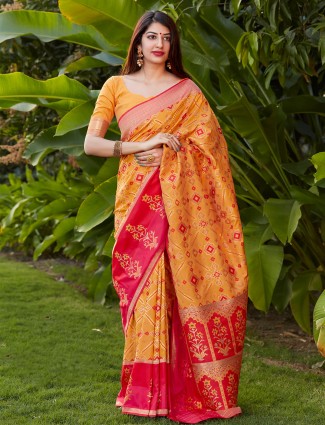 Wedding occasions tangy orange patola silk saree