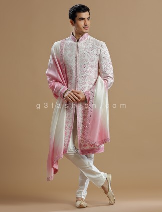 White and pink raw silk sherwani for groom