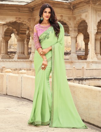 Wonderful designer satin saree for festive in pistachio green
