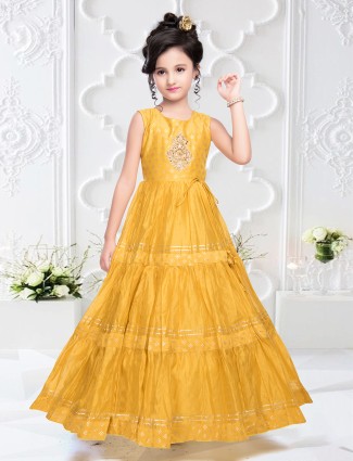 Yellow color silk gown for wedding event