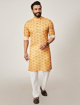 Yellow fesitve wear printed kurta with churidar